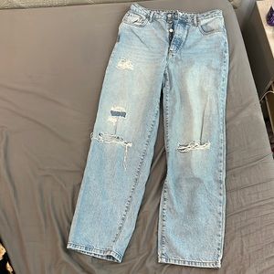 Blue jeans with cuts in them from Forever 21